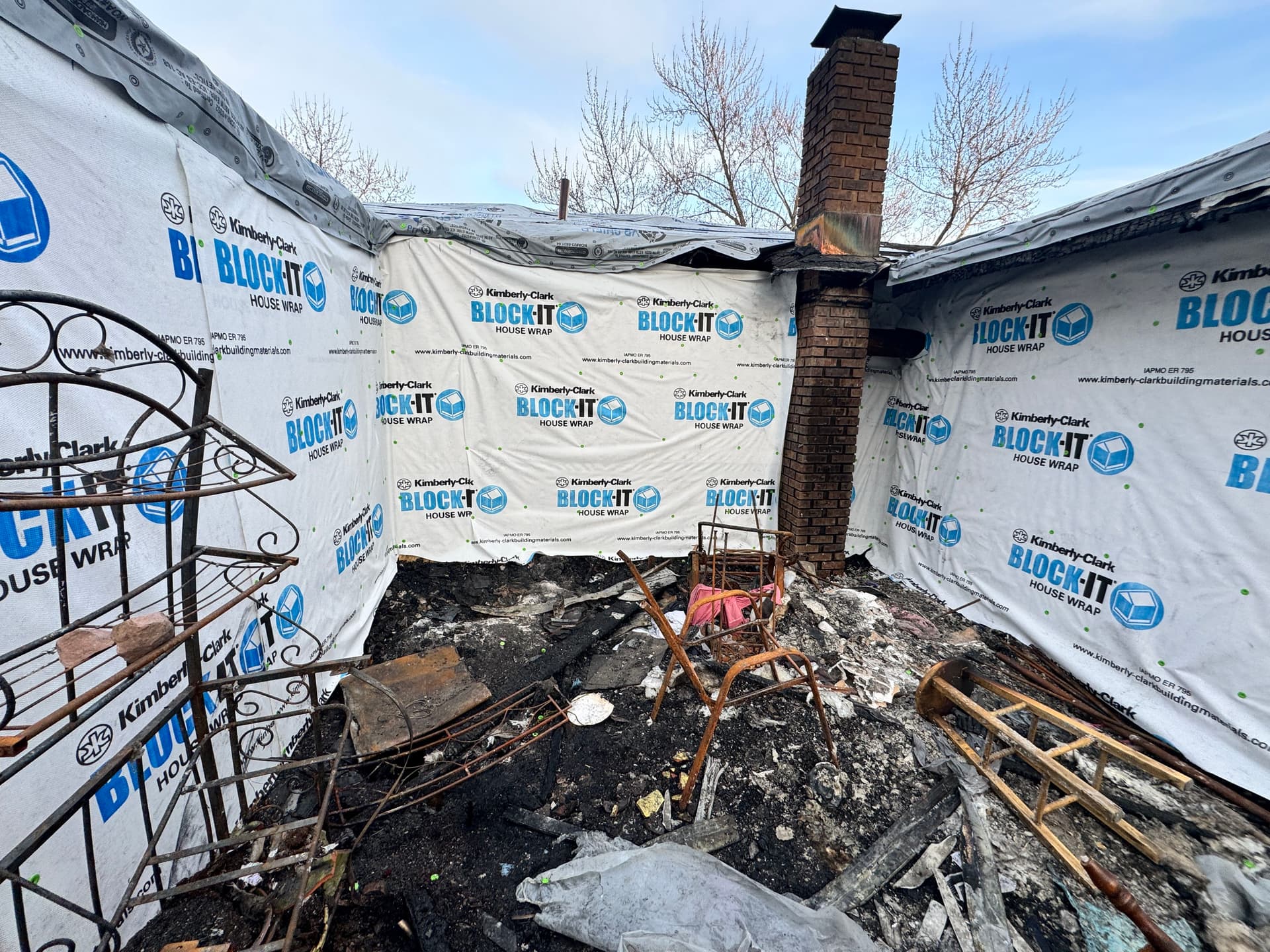 Emergency Board-Up After Severe House Fire Guts Back Deck and Framing