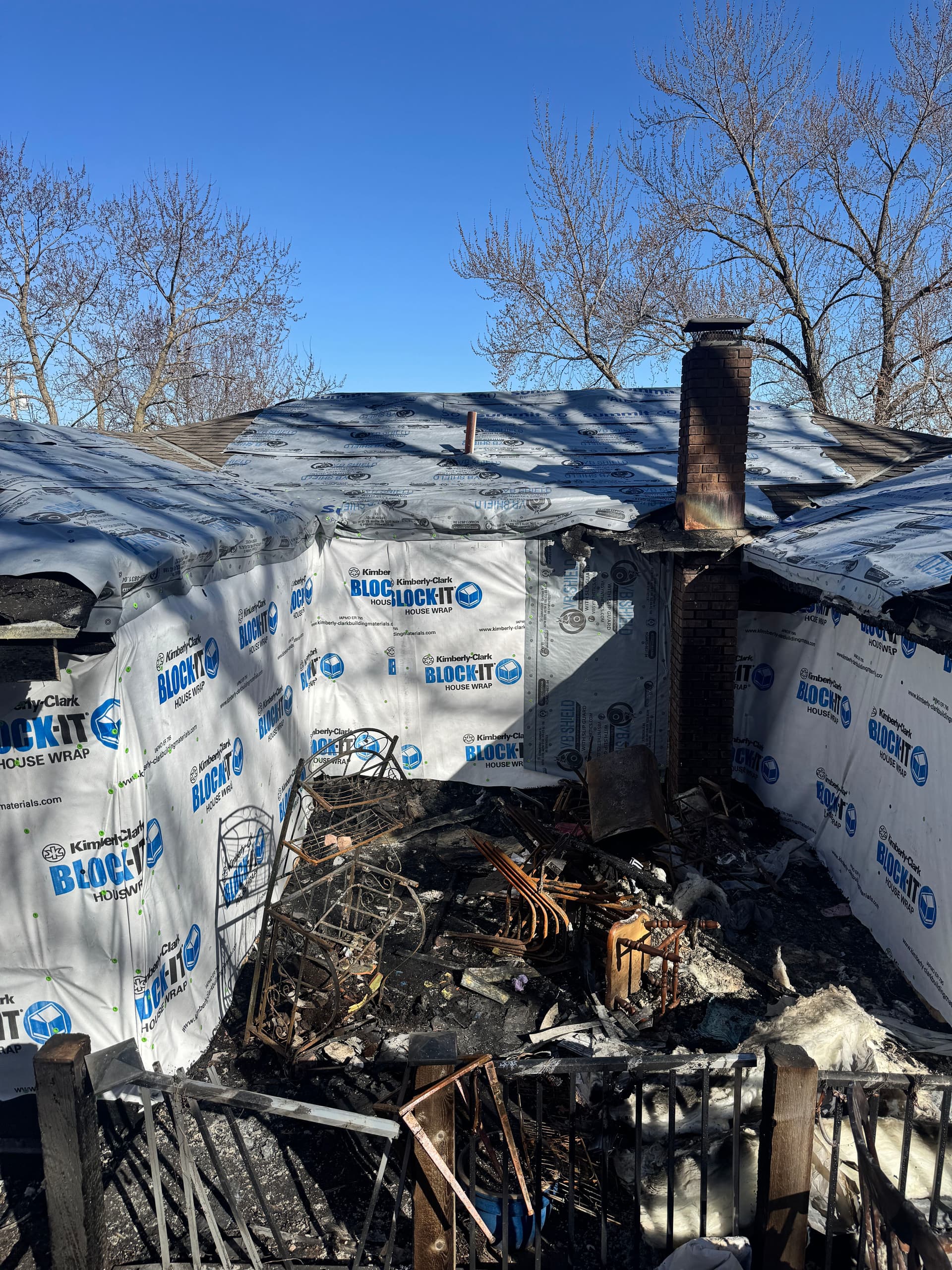 Emergency Board-Up After Severe House Fire Guts Back Deck and Framing