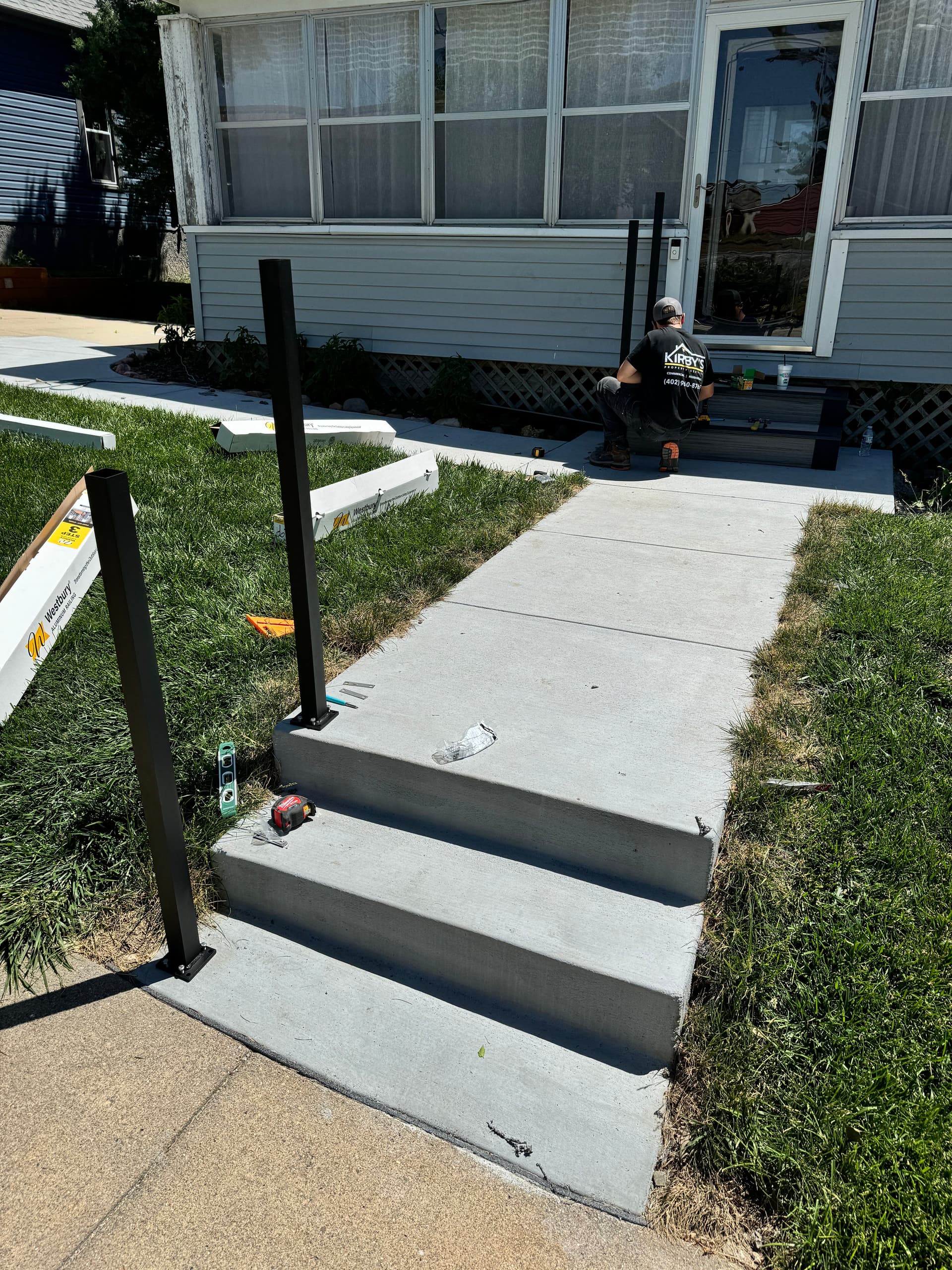 Gallery photos for Composite Stair Build with Westbury Aluminum Railing on a Front Entry: Image #6