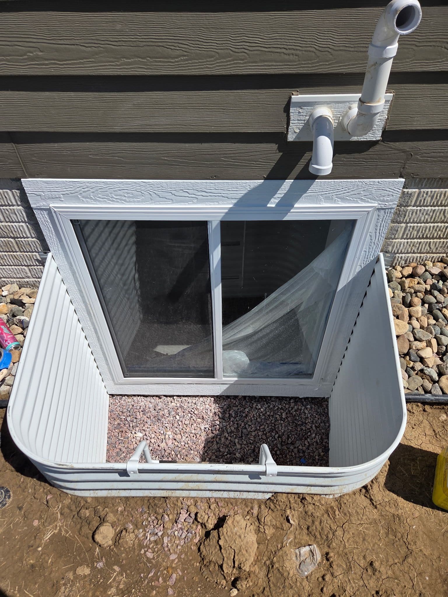 Adding an Egress Window to Create a Code-Compliant Basement Bedroom image