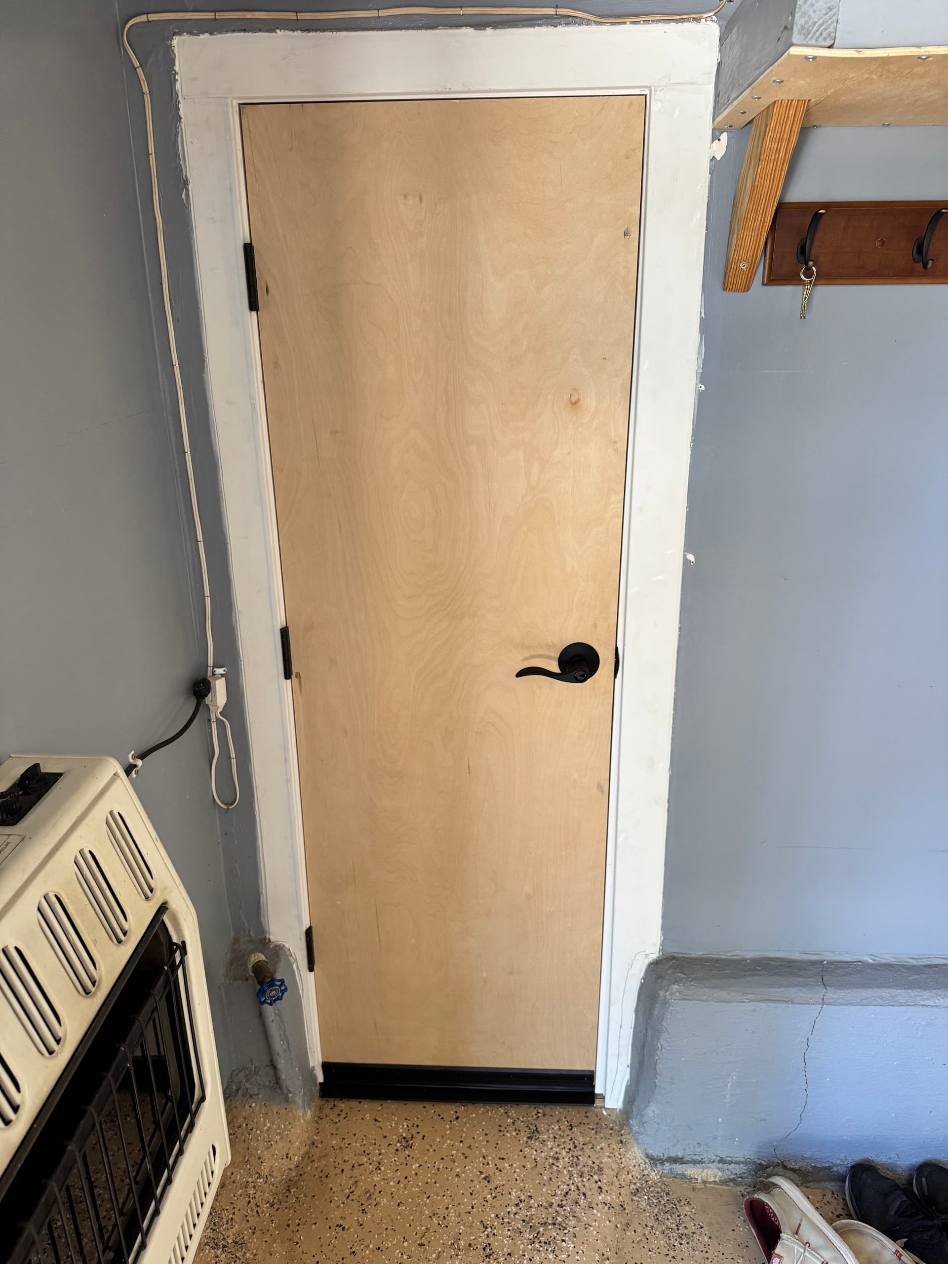 Custom Door Install for a Non-Standard Garage-to-Kitchen Opening image