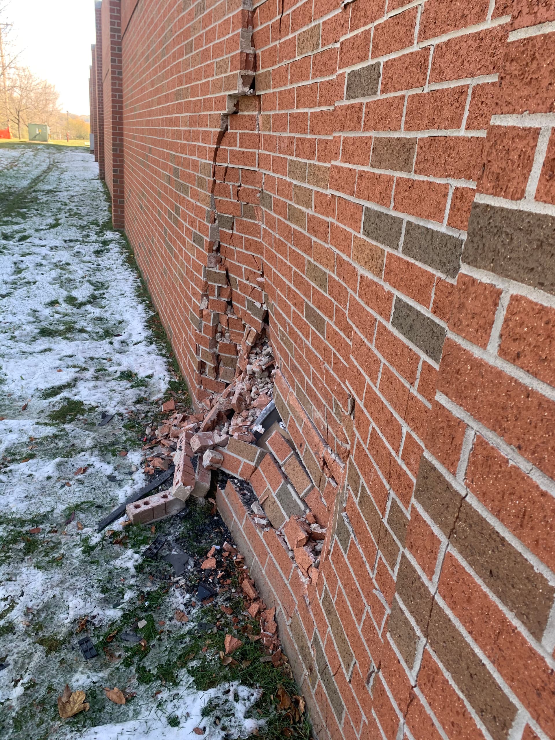 Vehicle Impact Brick Wall Damage Secured Fast in Omaha image