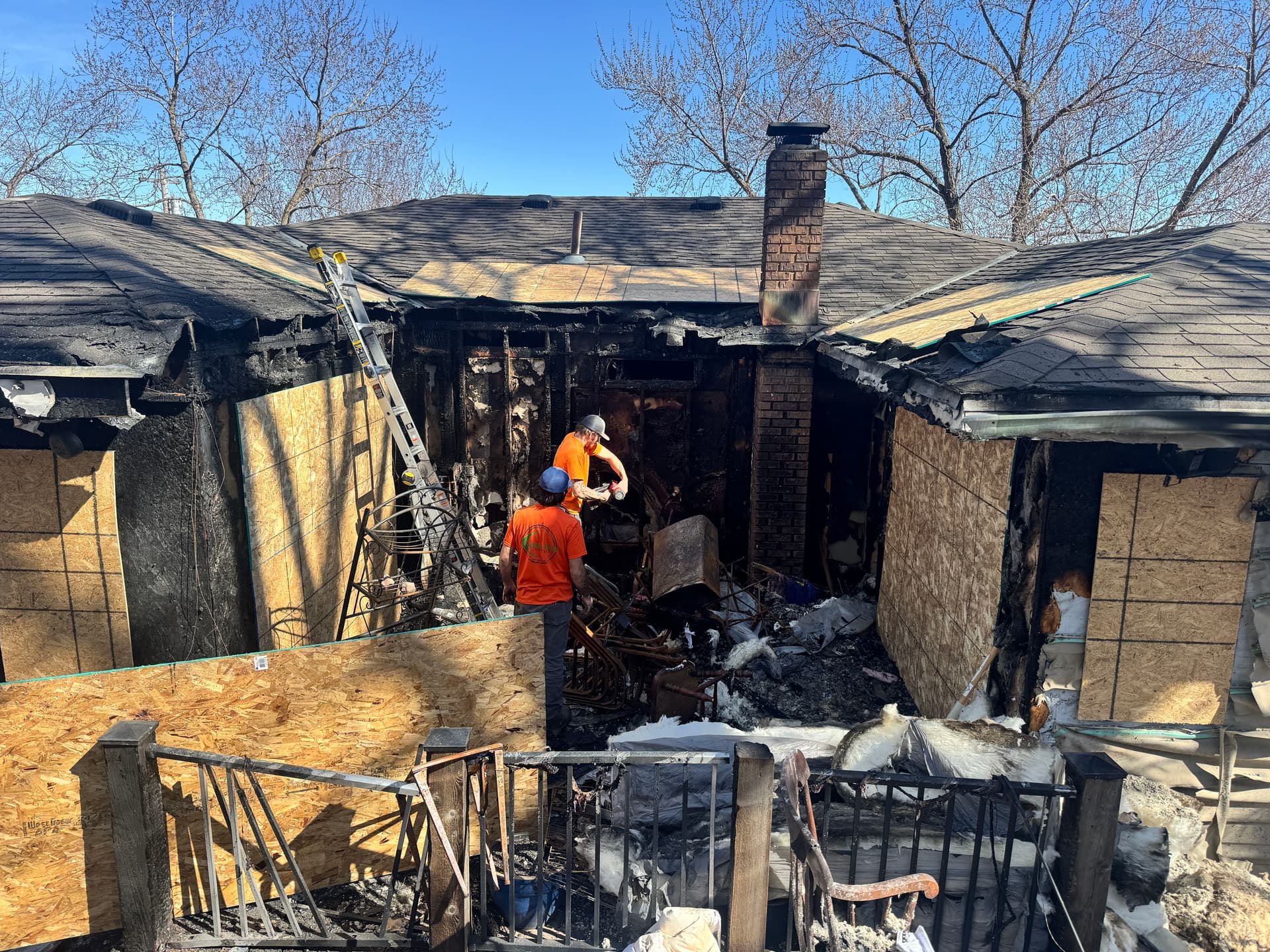 Emergency Board-Up After Severe House Fire Guts Back Deck and Framing