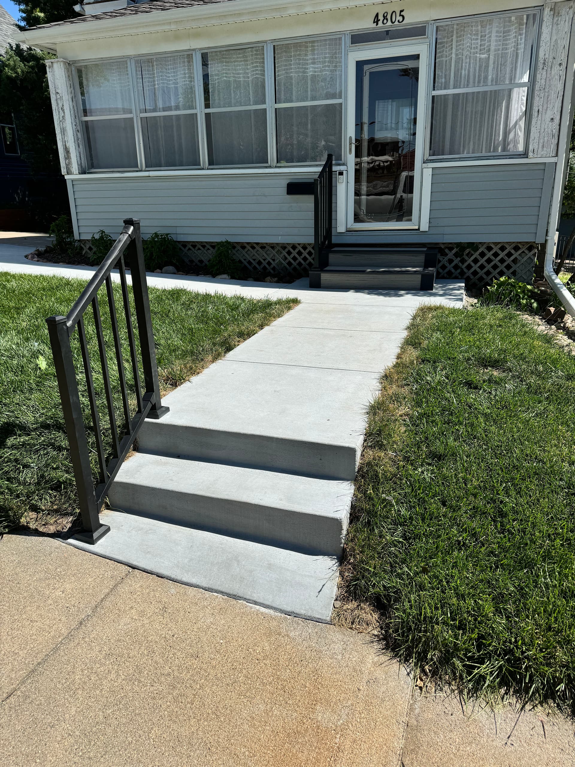 Gallery photos for Composite Stair Build with Westbury Aluminum Railing on a Front Entry: Image #7