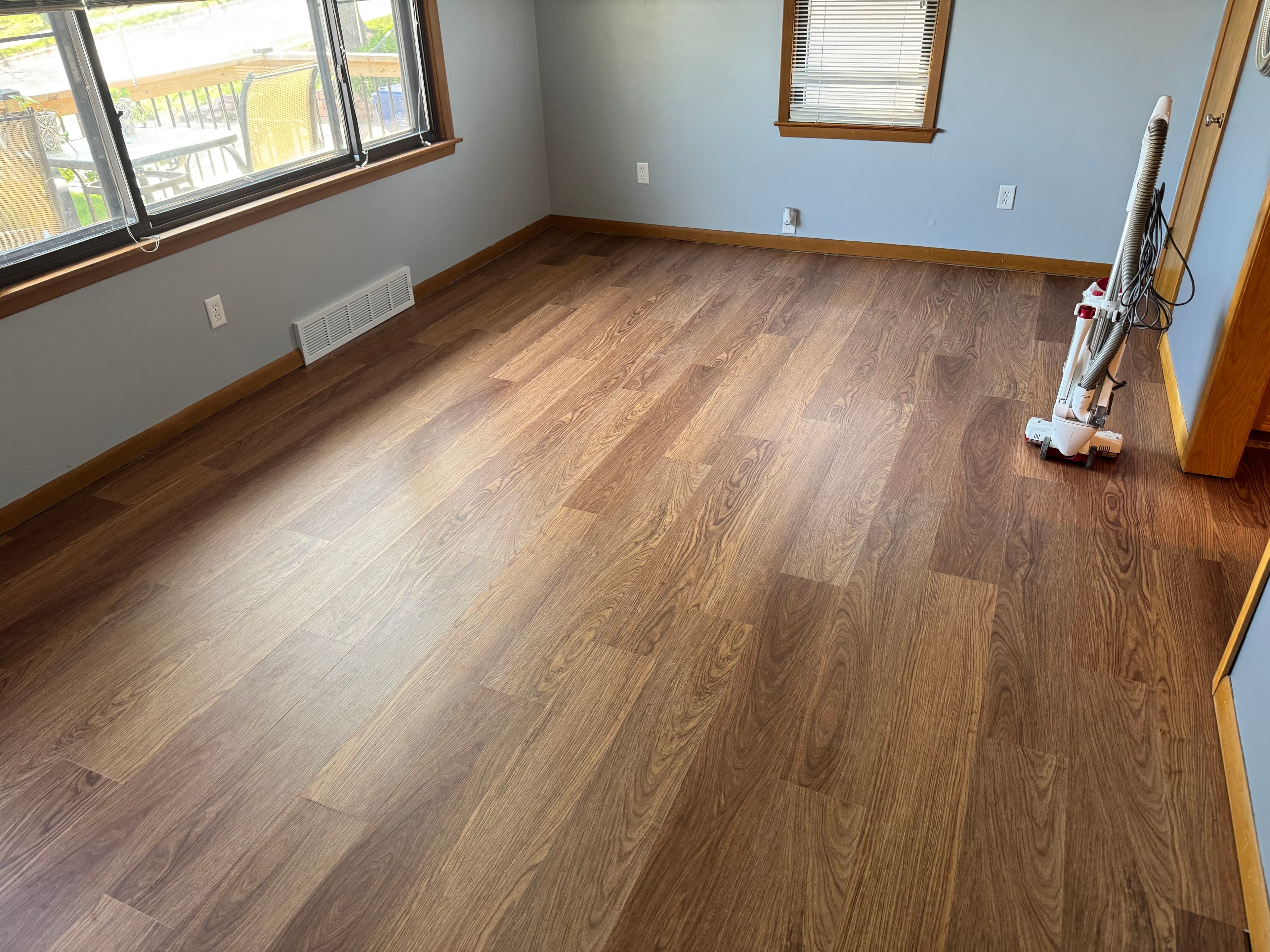 Project Luxy Vinyl Plank Flooring Installed Across Five Rooms image