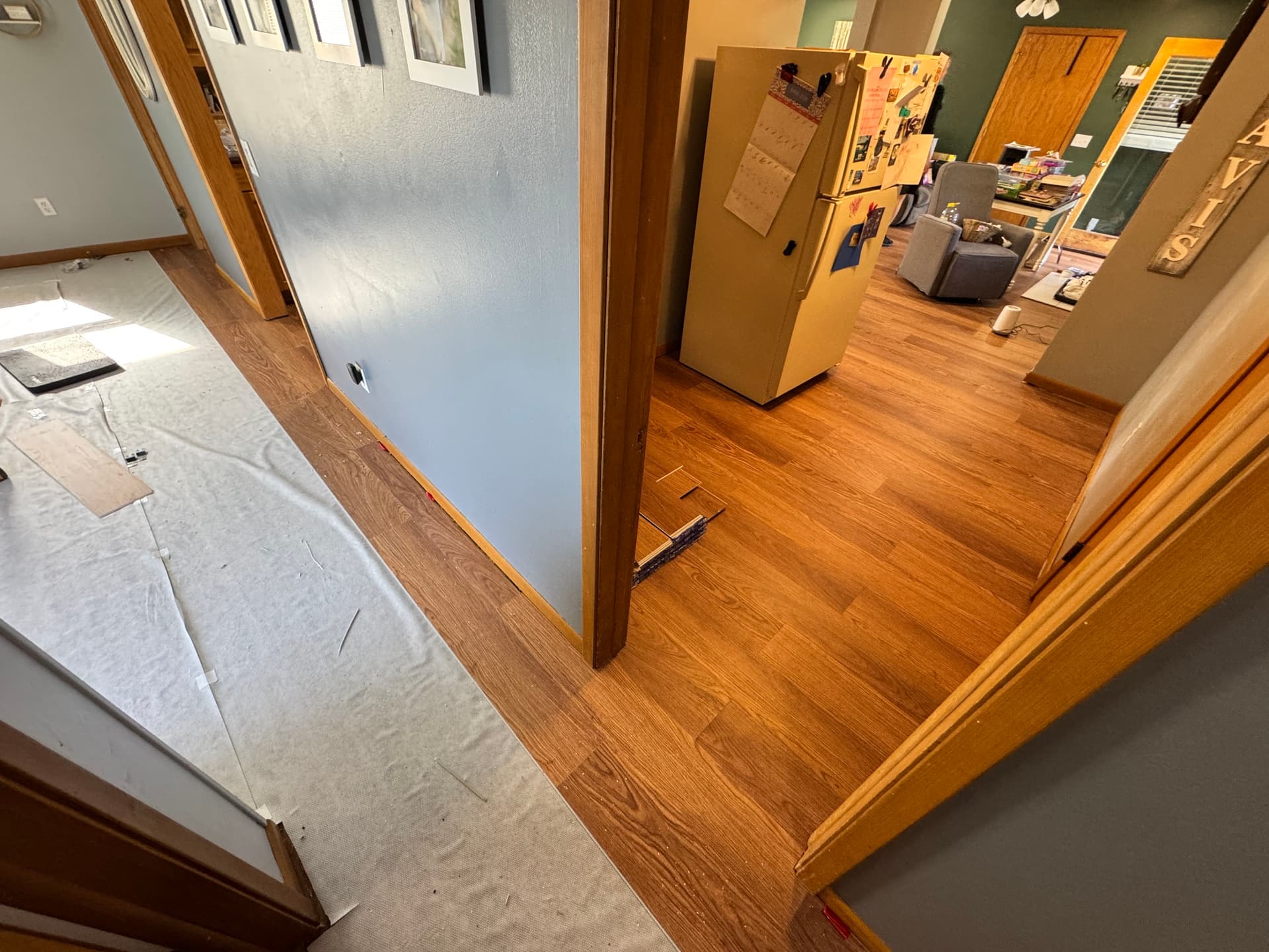 Luxy Vinyl Plank Flooring Installed Across Five Rooms