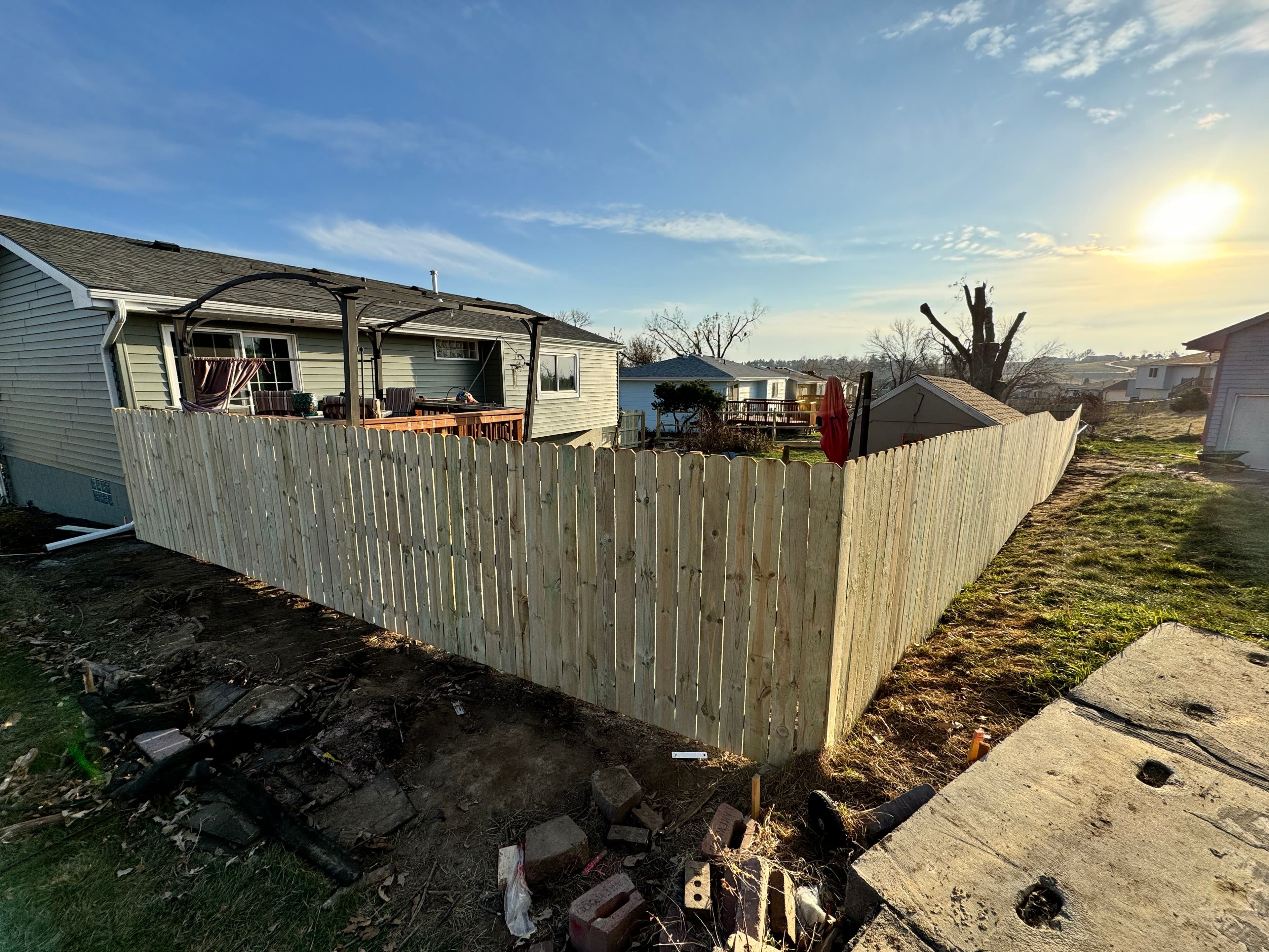 Project Storm-Damaged Backyard Fence Torn Down and Rebuilt From Scratch image